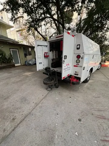 Magnet Plumbing service vehicle on-site for Sewer Line Repair in Lisbon